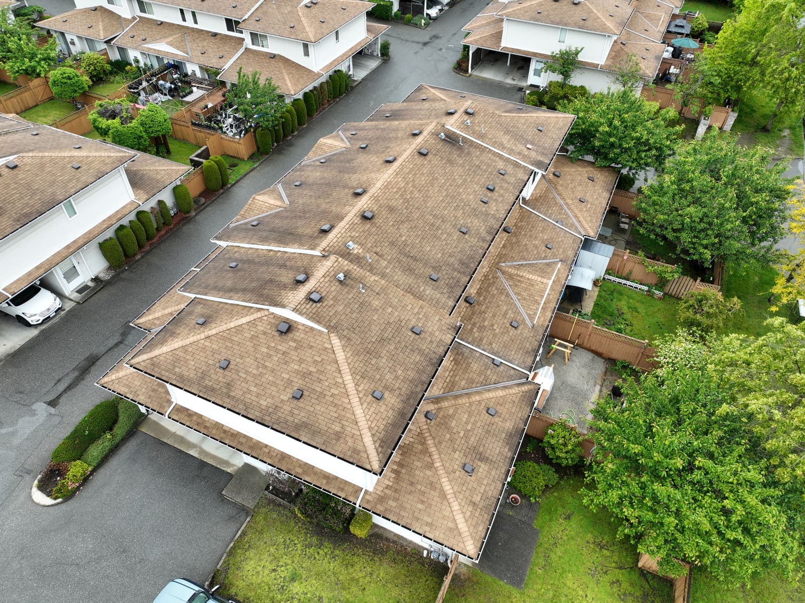 Drone view of a strata roof after moss removal