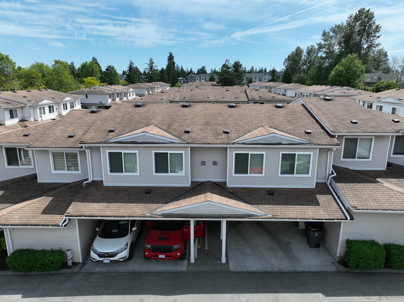 A clean townhouse roof after cleaning, the goal for a newly re-roofed home