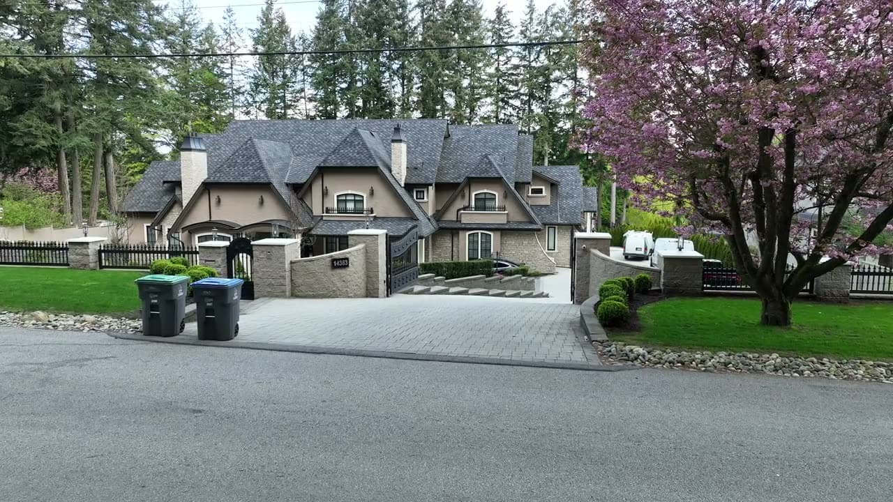 Large estate property with a wide multi-section roof